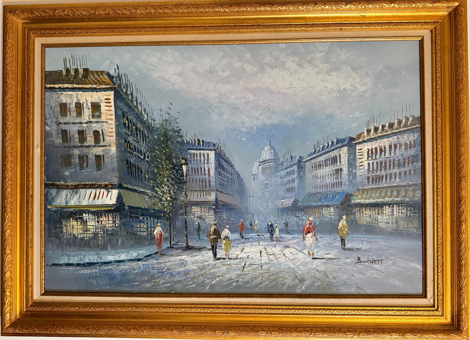 Large Impressionist European Boulevard Street Scene Oil Painting Signed Burnett: Impressionist oil on canvas painting depicting a lively European boulevard scene with figures strolling along a grand architectural avenue beneath an illuminated sky.Executed with expressive