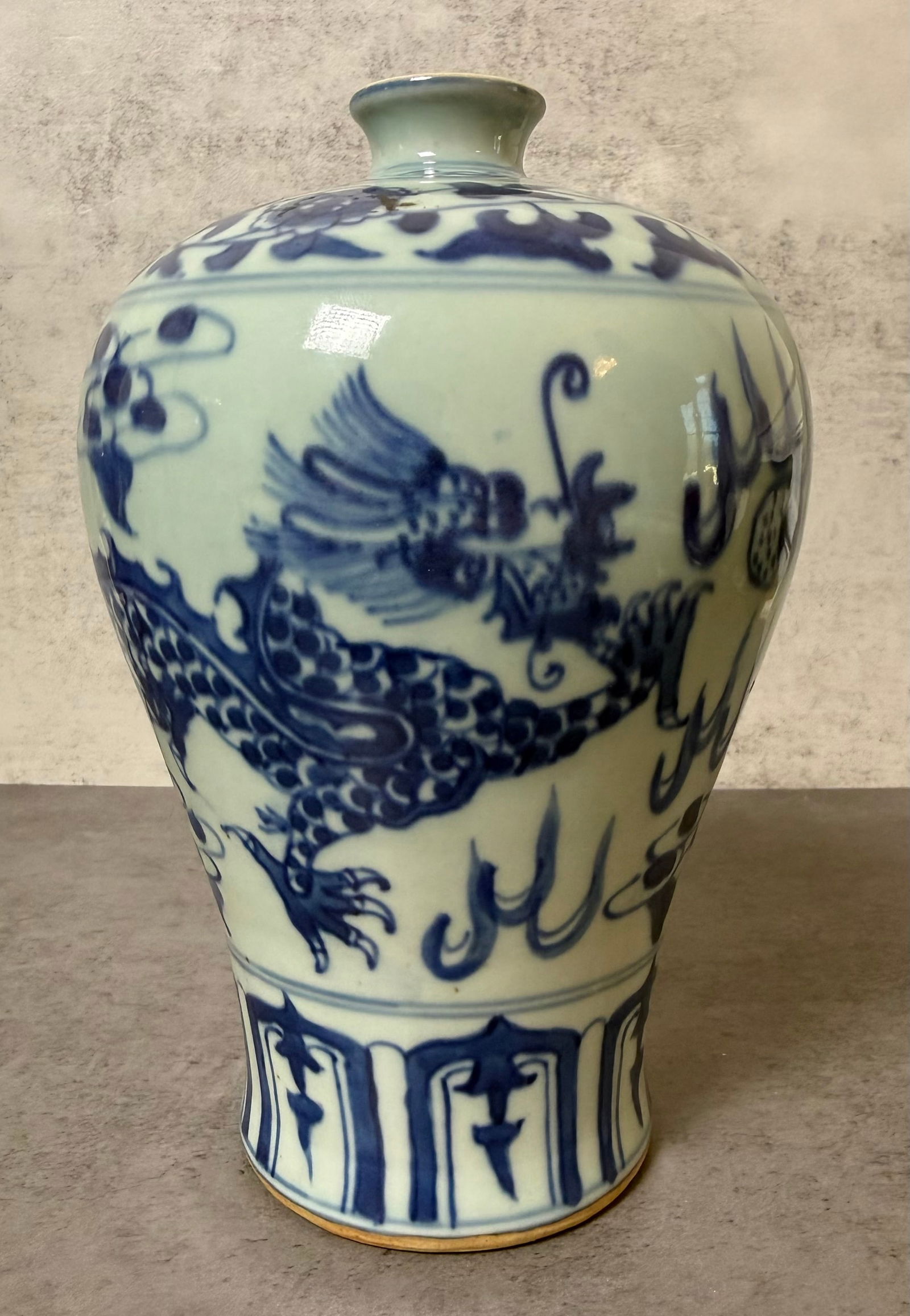 Chinese Blue and White Phoenix Vase with Apocryphal Hongzhi Mark, 20th Century: Chinese blue and white porcelain vase decorated with a large phoenix among stylized flames and cloud motifs. The lower section with geometric border decoration and the shoulder with additional