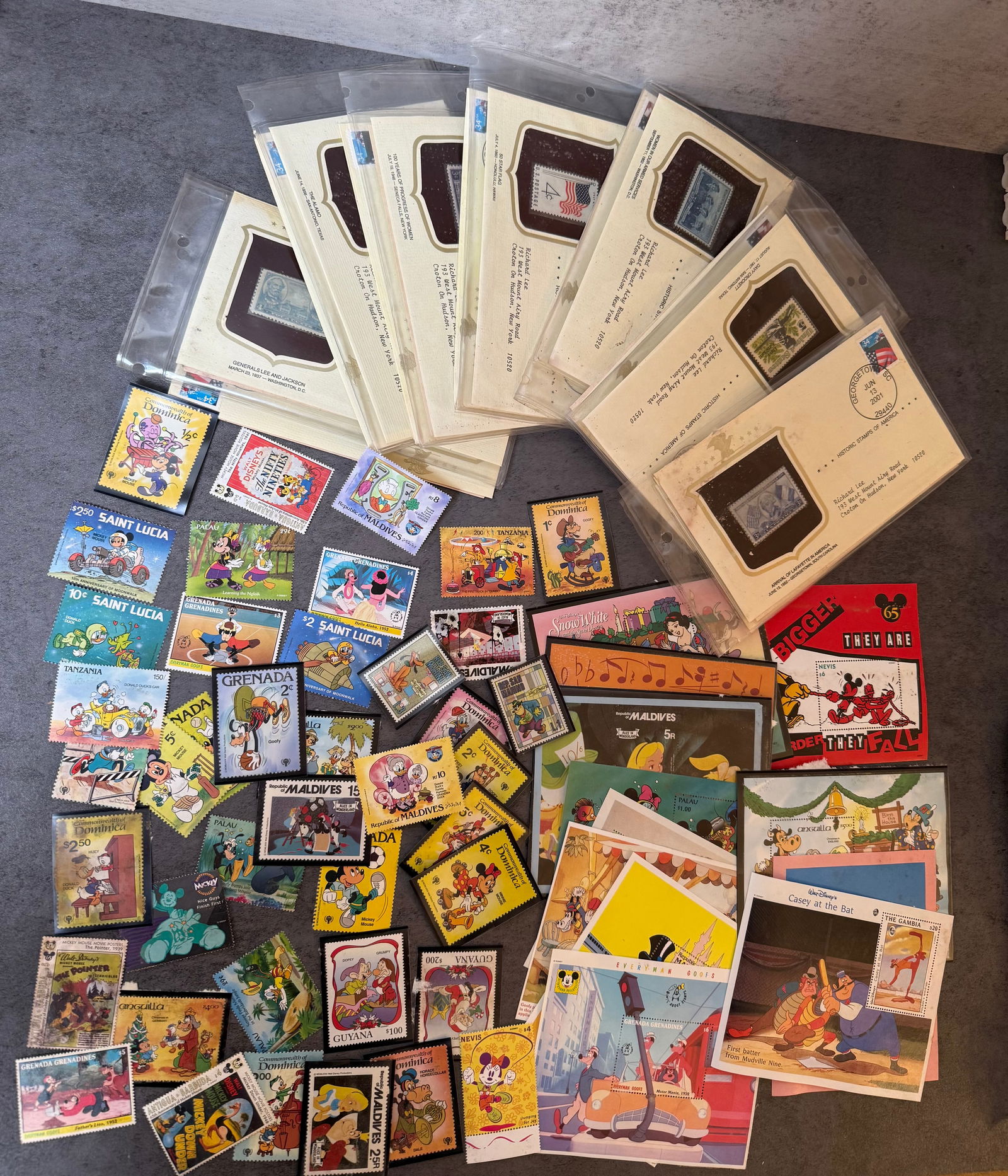 Large Disney Themed Stamp Collection – Souvenir Sheets, First Day Covers & Worldwide Issues: Large collection of Disney themed postage stamps and philatelic materials including loose stamps, souvenir sheets, and first day covers.The lot includes numerous colorful Disney character issues from
