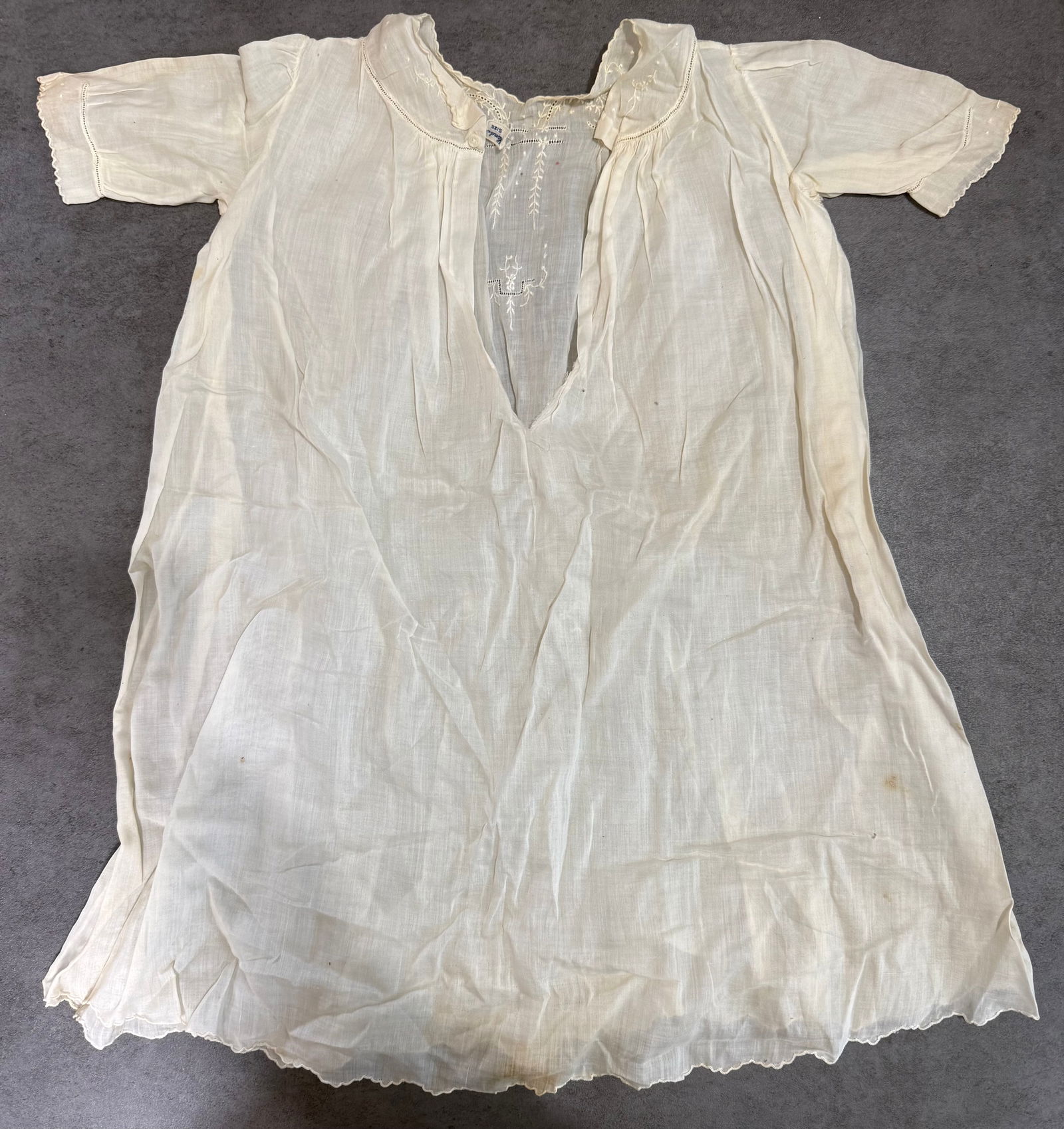 Victorian Edwardian Child Embroidered White Cotton Nightgown c.1880-1910: A charming antique child's white cotton lawn nightgown or christening dress, dating to the late Victorian or Edwardian era (circa 1880–1910). This delicate garment features:Fine semi-sheer cotton la