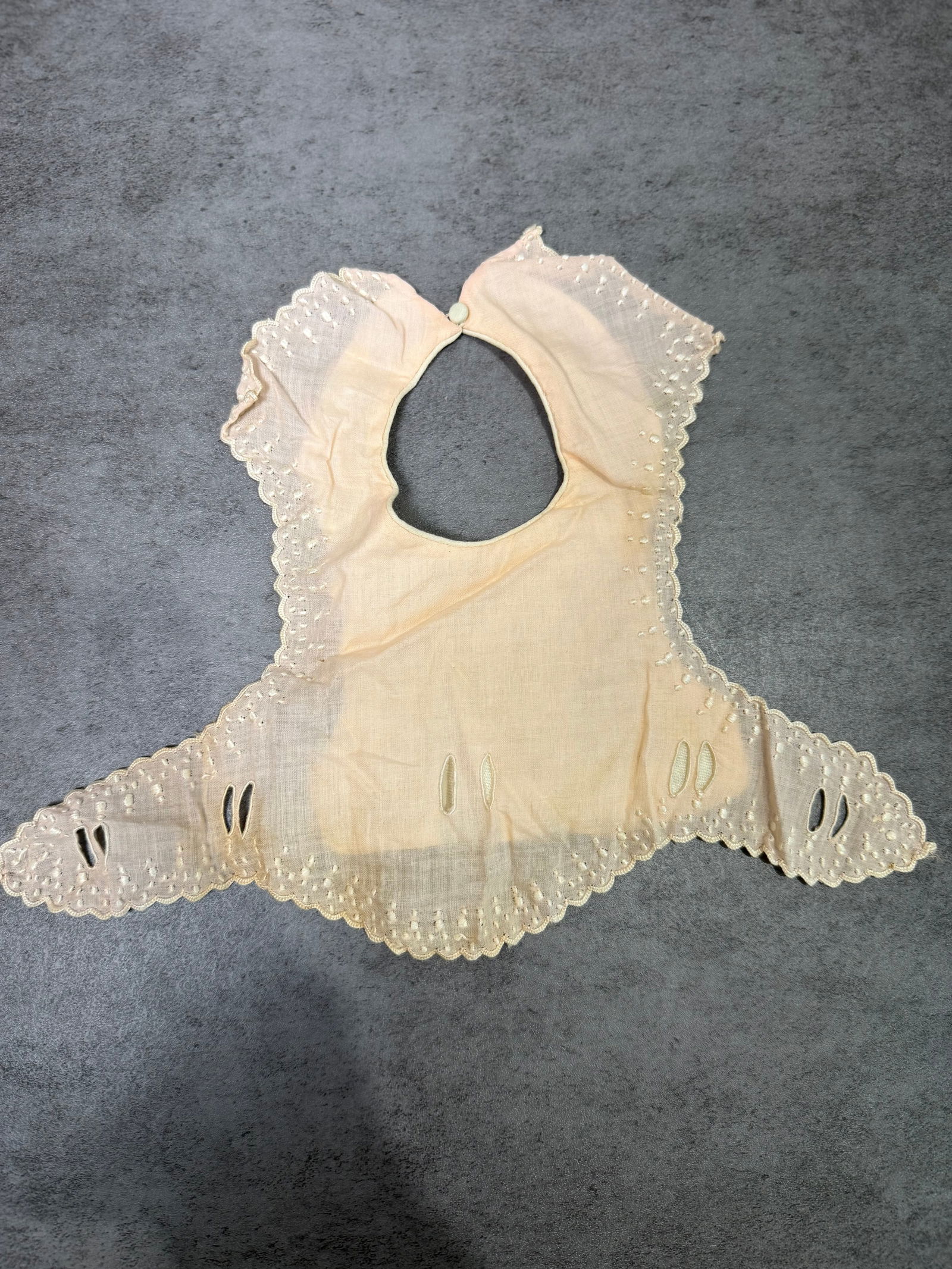Antique Baby Bib White Cotton Eyelet Embroidery Scallop Edge c.1900: Antique Victorian or Edwardian era baby bib, circa 1890–1910. Fine white cotton lawn with beautiful broderie anglaise (eyelet embroidery) detailing throughout. Features a scalloped edge border,