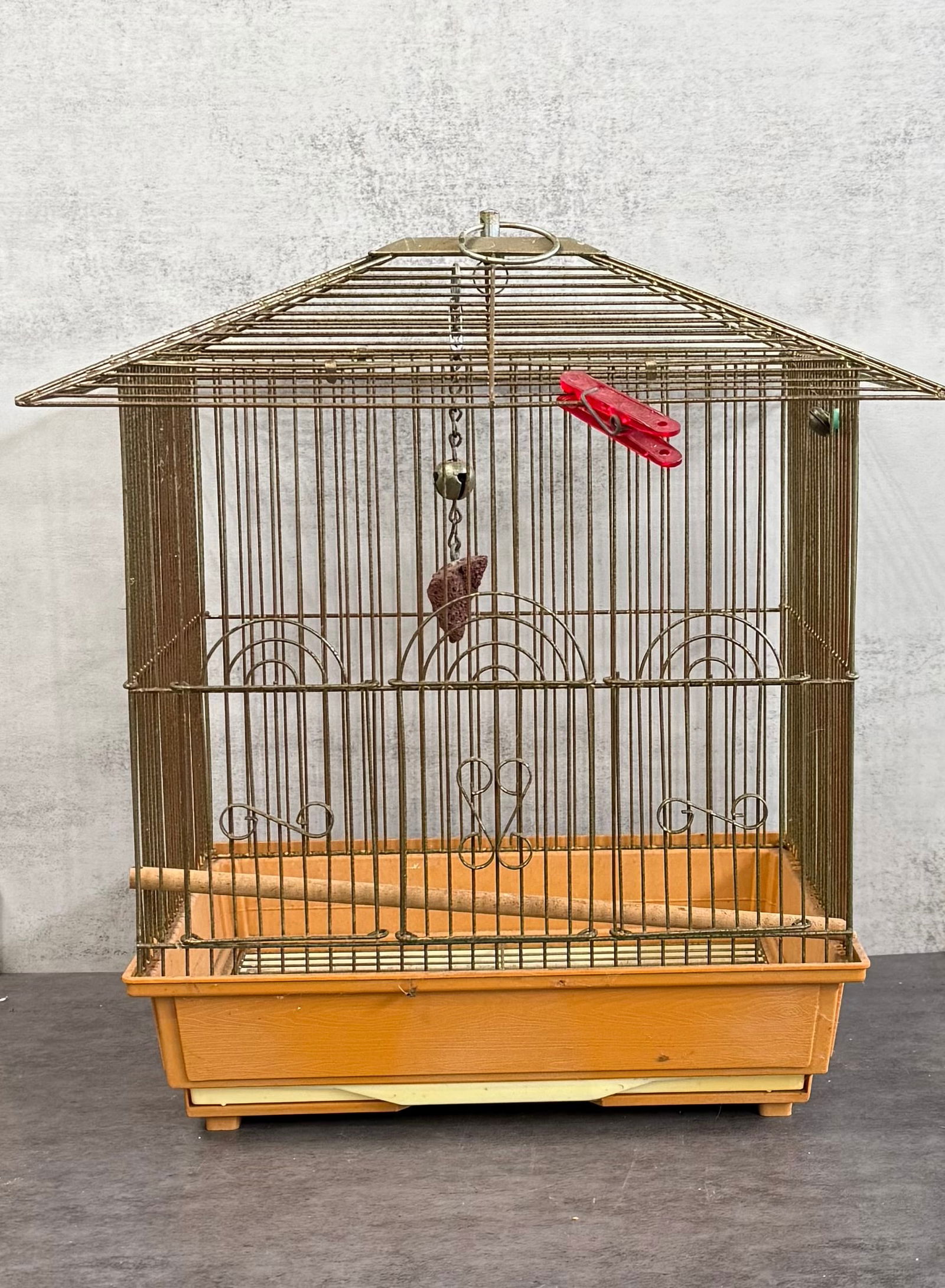Vintage Metal Bird Cage with Tray, Decorative Pet Cage: A vintage metal bird cage featuring a rectangular form with a sloped roof and decorative wire details.Includes a removable plastic base tray and interior perch. The cage shows a classic mid-century