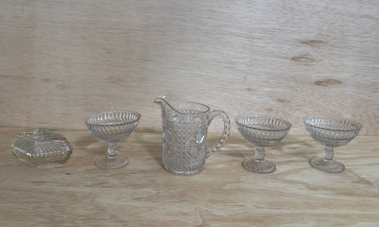 EAPG Pressed Glass Lot 5 Creamer Compote Dish Diamond Star Pattern AS IS: A collection of five clear pressed glass pieces in matching or complementary diamond, star, and ribbed fan patterns, consistent with Early American Pattern Glass (EAPG) production, late 19th to early