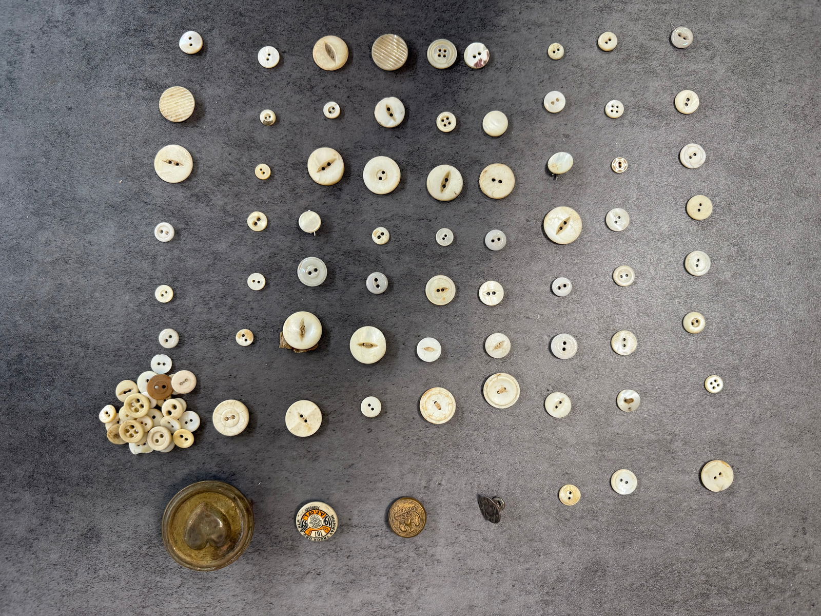 Antique Victorian Mother of Pearl Shell Button Lot 80+ Bone Military Badge: A large collection of antique and vintage buttons, approximately 80+ pieces, predominantly mother-of-pearl and shell buttons in various sizes from small to large, with 2-hole and 4-hole
