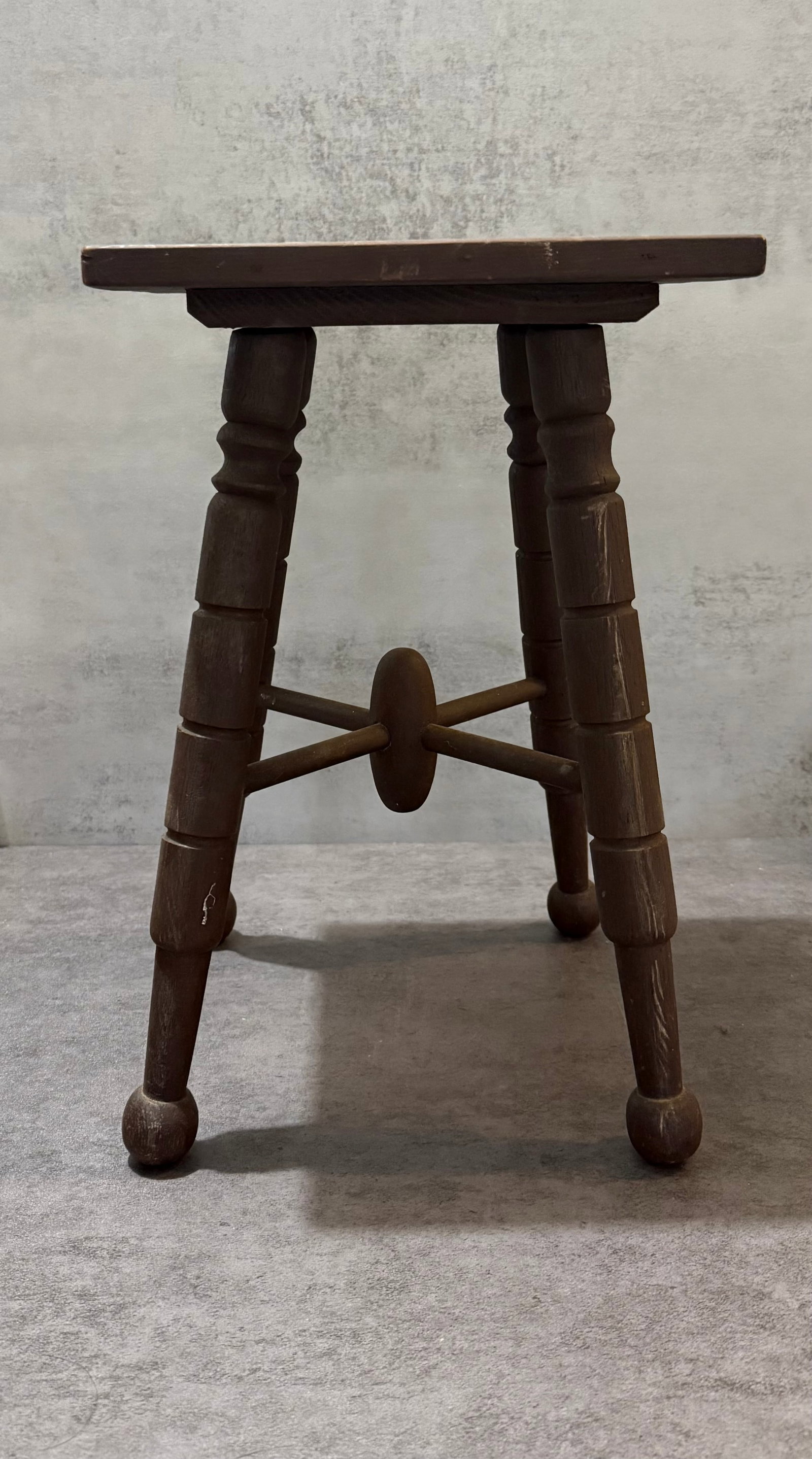 Rustic Square Wood Side Table / Plant Stand with Turned Legs: Rustic wooden side table or plant stand featuring a square top raised on turned legs with stretcher supports below. The piece has a simple country farmhouse character, with a warm brown finish and
