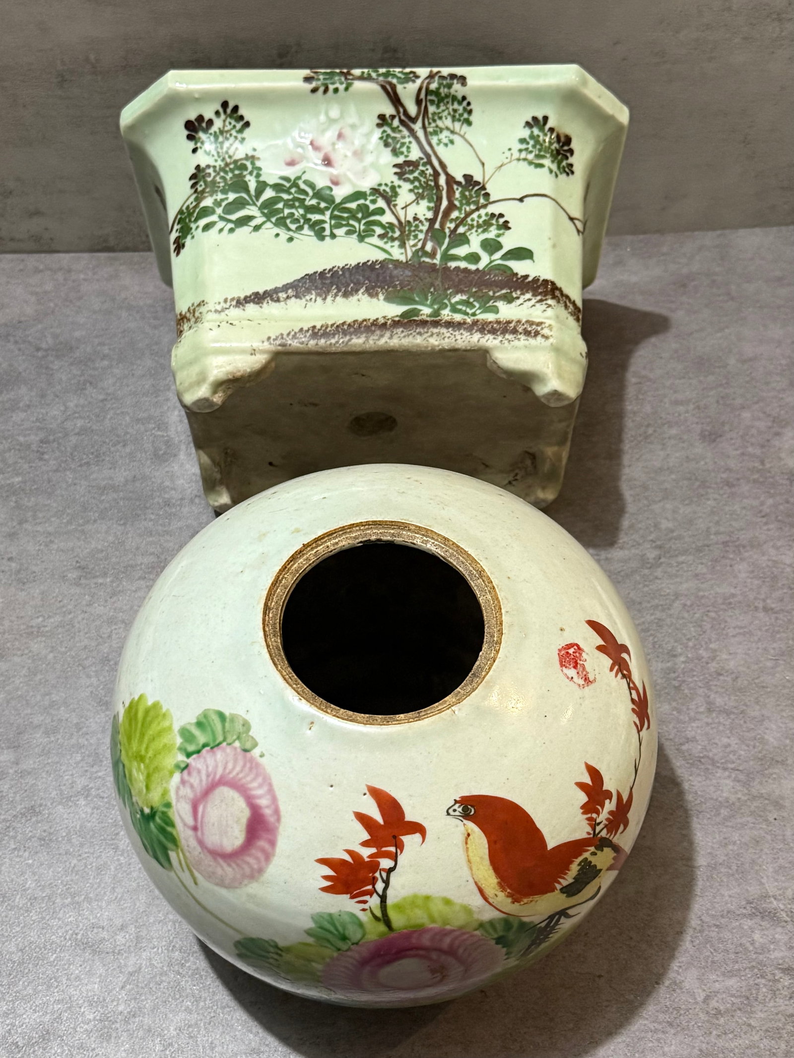 Chinese Famille Rose Porcelain Planter and Covered Jar Base with Bird & Floral Decoration: A group of two Chinese porcelain decorative items, including a famille rose porcelain planter of rectangular form and a rounded jar base. Both pieces are hand-painted with floral and landscape motifs