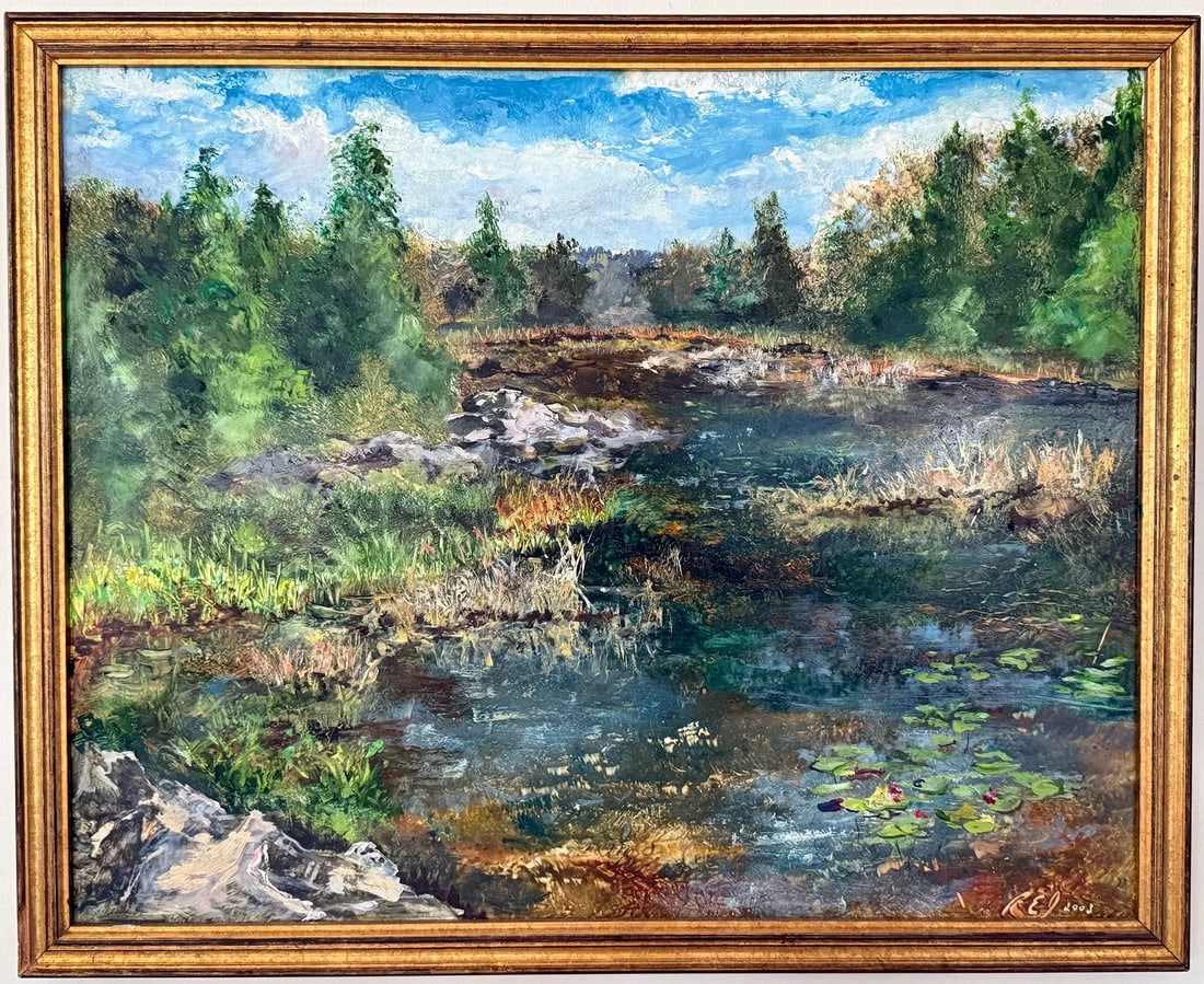 Signed Landscape Marsh Scene Oil Painting 17 x 21 in.: A signed original landscape painting depicting a tranquil marsh or pond surrounded by lush trees beneath a bright blue sky. Richly layered brushwork captures reflections on the water, grasses, rocks, 