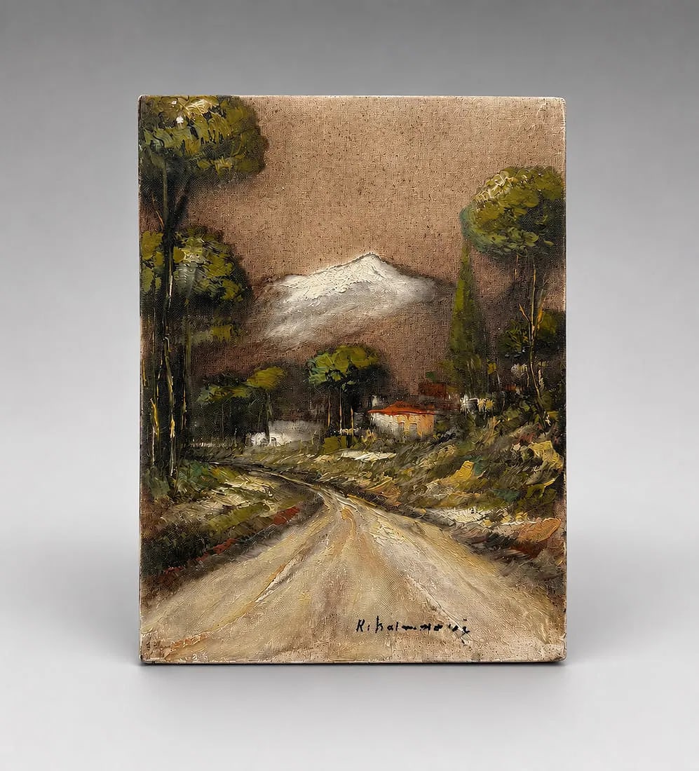 Signed Mountain Landscape Oil Painting on Canvas: A signed original oil painting depicting a tranquil mountain landscape with a winding country road leading toward a snow-capped peak. Framed by tall trees and accented with a small countryside cottage
