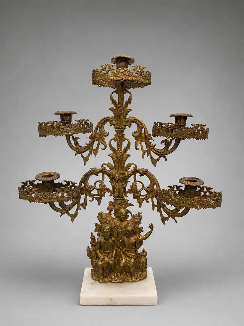 French Style Gilt Metal Five-Light Figural Candelabrum with Marble Base: An elegant antique French-style five-light candelabrum featuring an ornate gilt bronze body with scrolling acanthus arms, pierced candle cups, and a finely cast figural base depicting three classical 