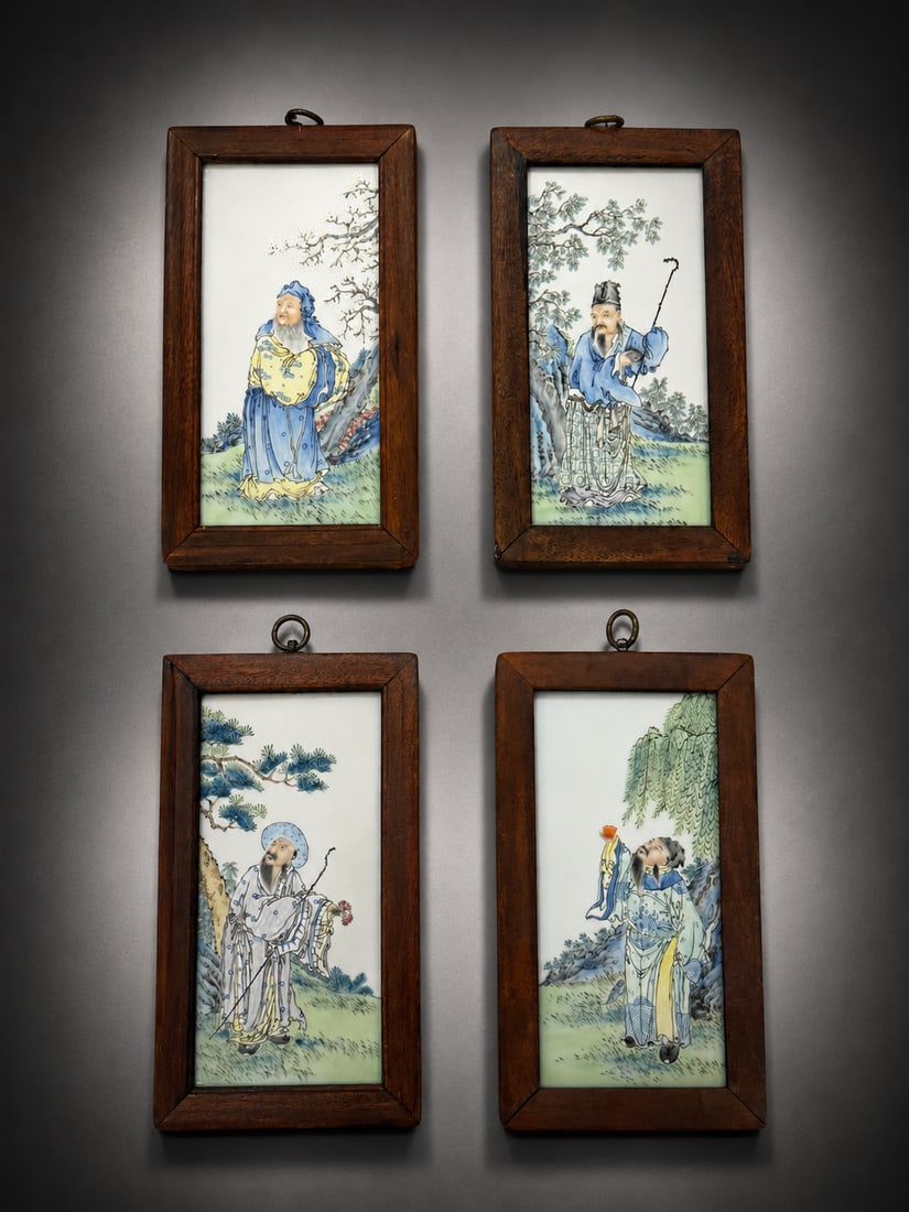 Set of Four Chinese Famille Rose Porcelain Figure Plaques: A set of four Chinese porcelain plaques, each finely decorated in famille rose enamels with a different male figure depicted in a landscape setting with trees, rocks and vegetation. Each porcelain