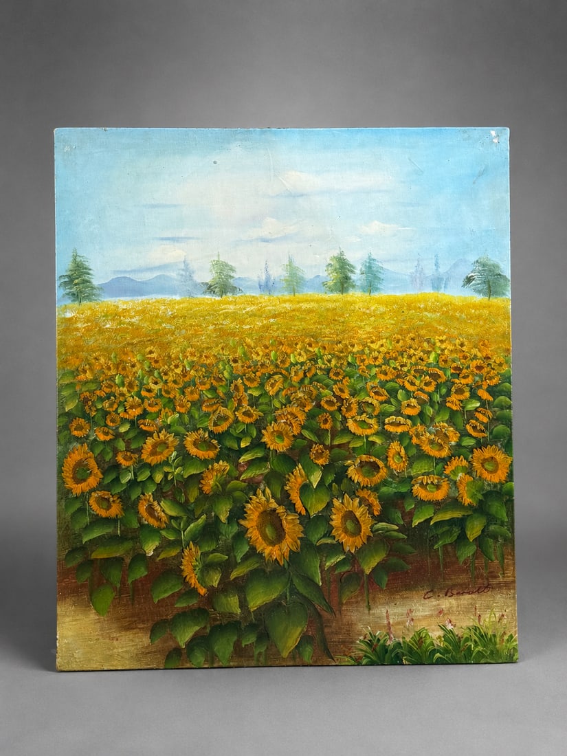 Signed Sunflower Field Landscape Oil Painting: An oil painting depicting an expansive field of sunflowers beneath a blue sky, with distant trees and mountains along the horizon. Rendered in vibrant yellow and green tones with textured brushwork th