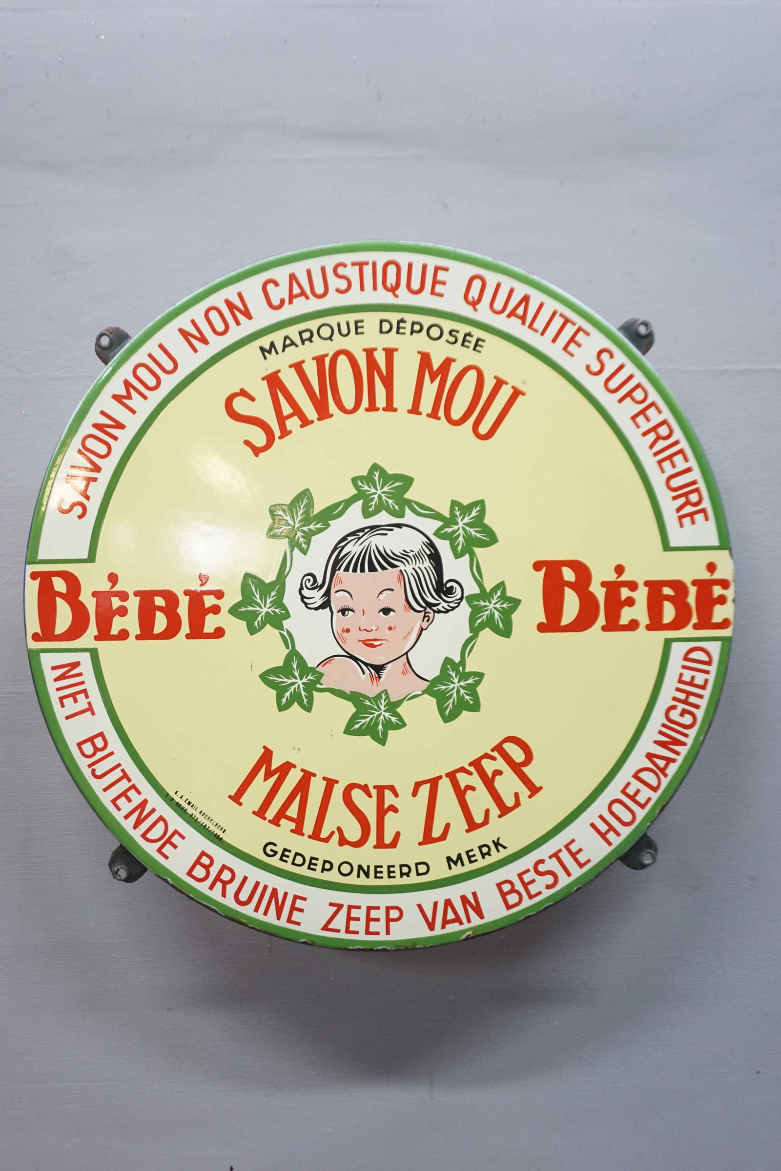 Enamel Sign: Enamel Sign Brand: Savon mou, Malse zeep Bébé Tax: T.P.BRUX.372/187/1954 Enamel Factory: S.A. EMAIL. KOEKELBERG Dimensions: ø51