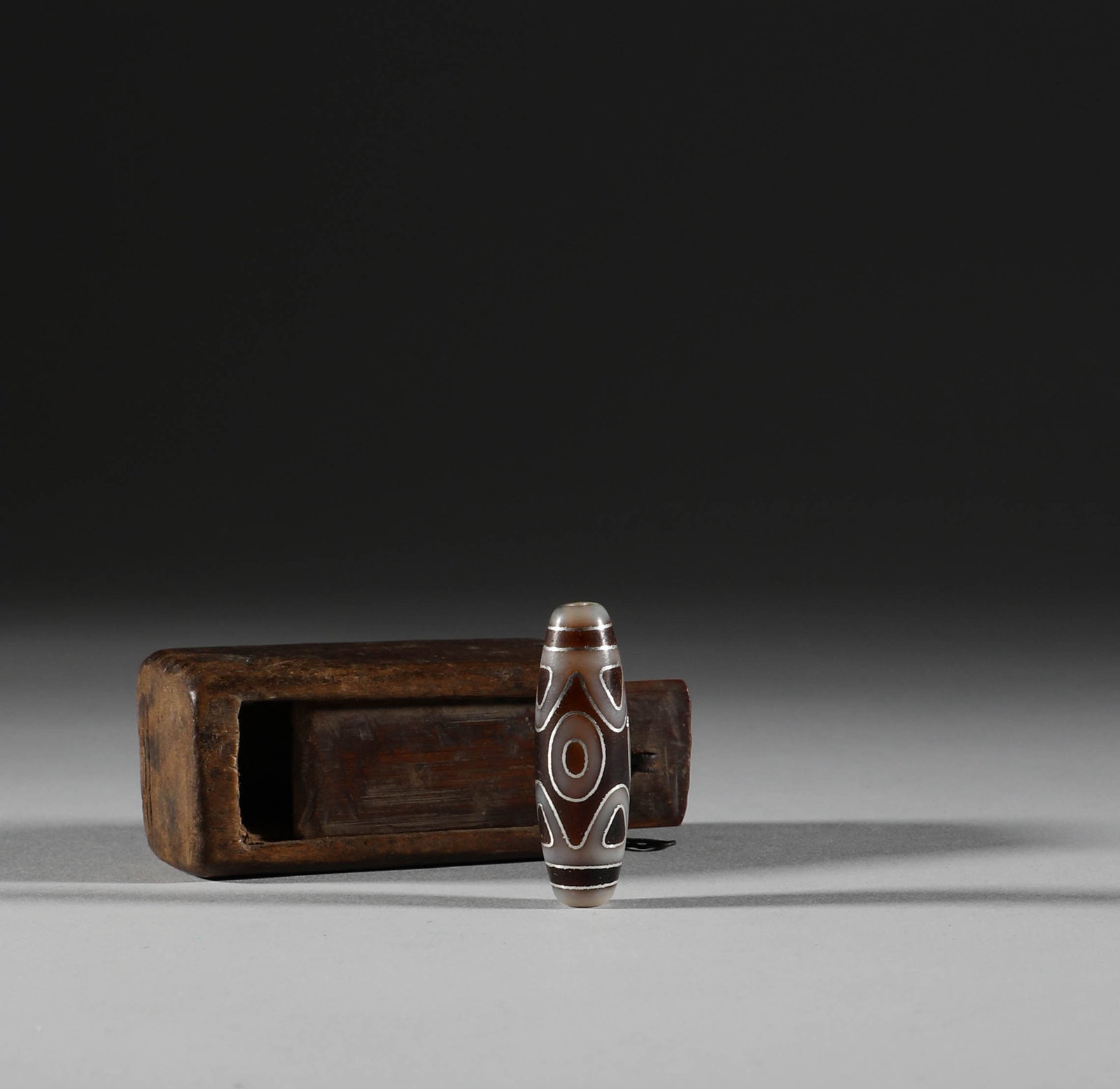 Tang Dynasty, Three eyed Tianzhu: Height: 3.9cm, width: 1.2cm, weight: 9g