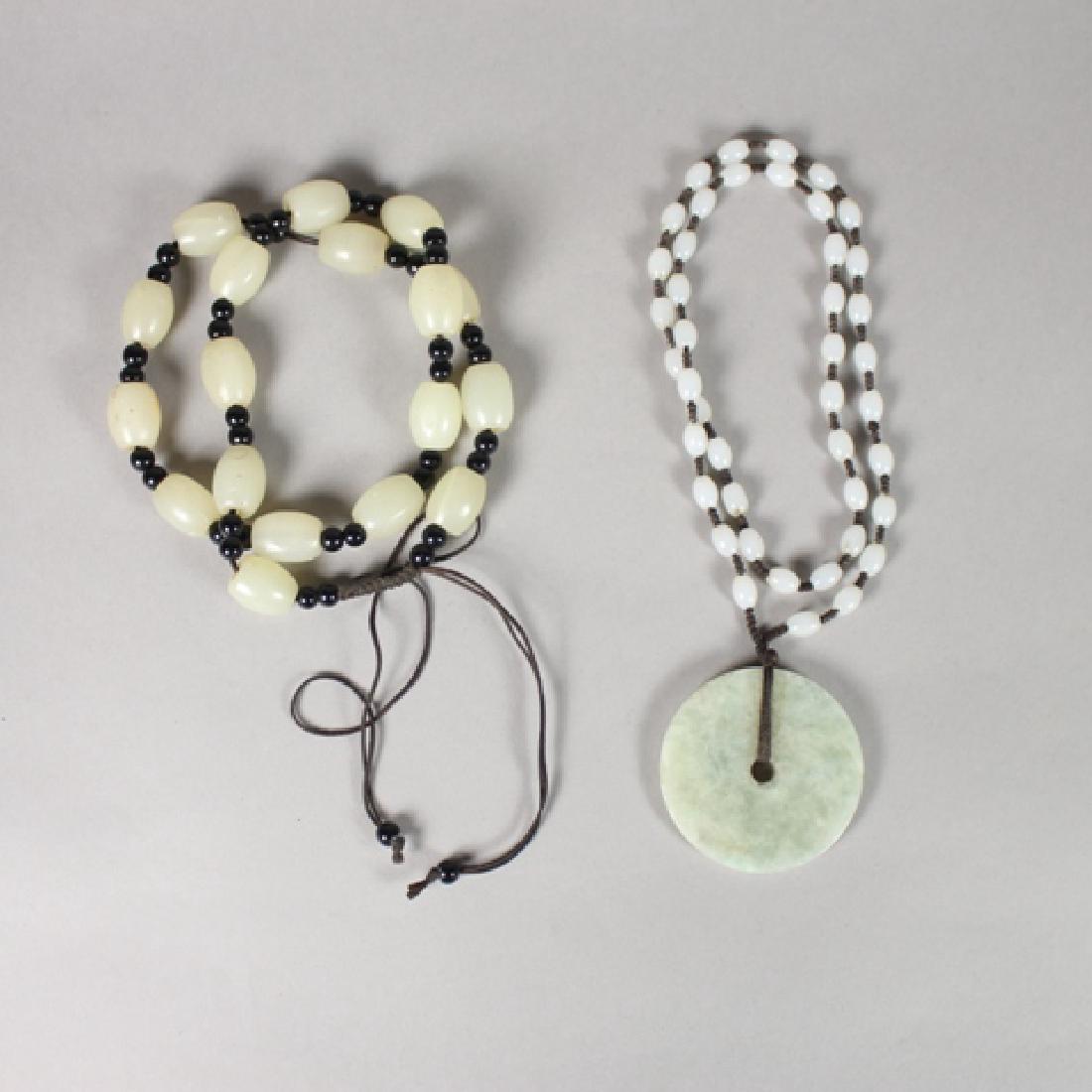White Jade Beaded Necklaces with Figural Pendants (1 of 6)