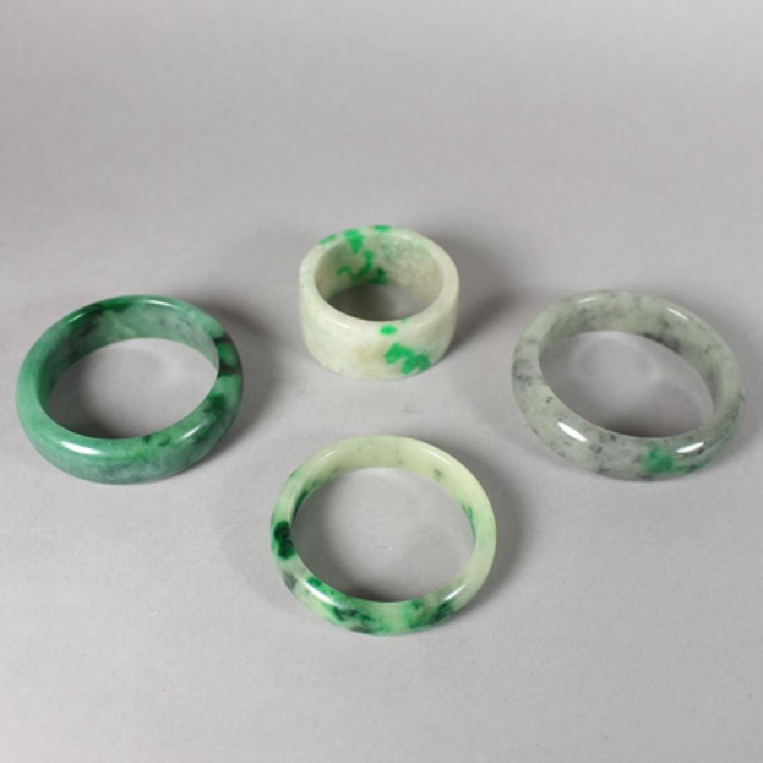Three 20th Century Jade Bangles and Napkin Ring (1 of 6)