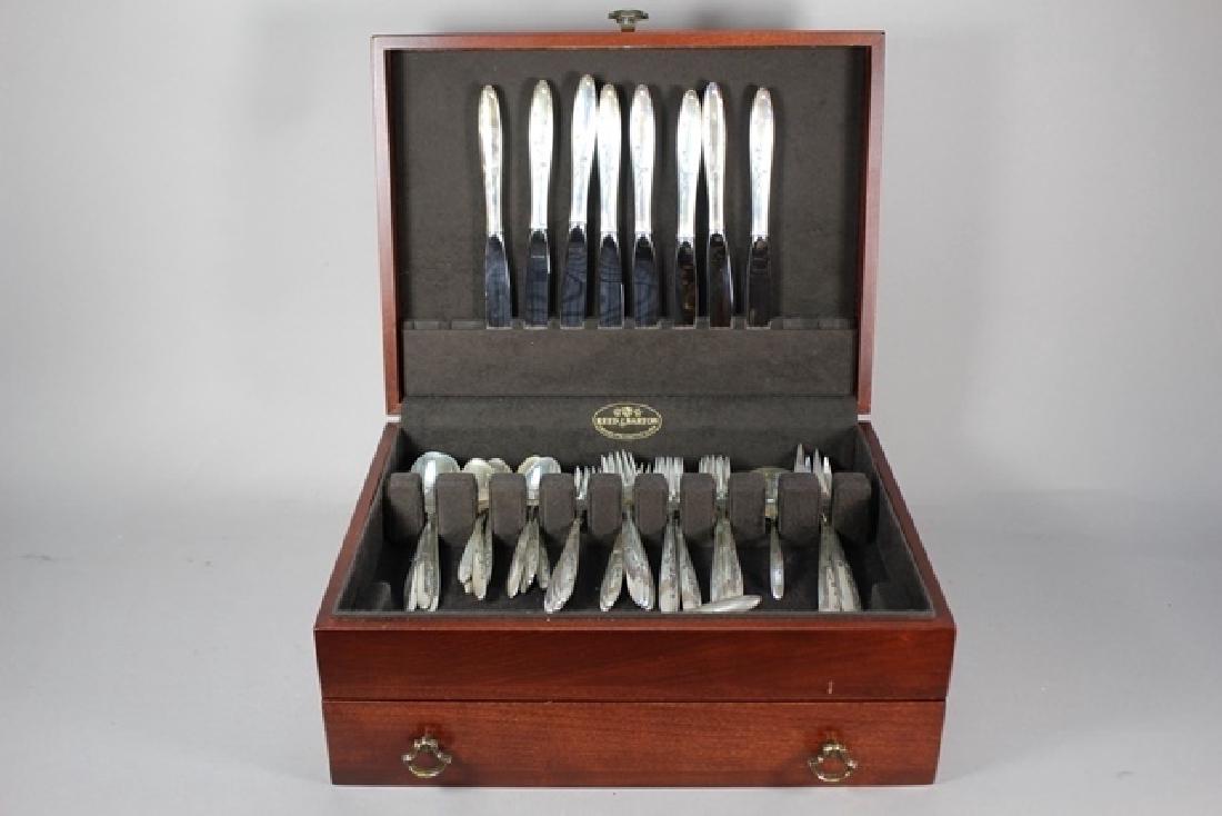 Gorham Sterling Silver Flate Ware Set: Sterling Silver flatware set. 8 Knives 3 serving spoons. 10 Tea spoons. 9 diner forks 7 salad forks. 2 Lg Serving forks. 8 Butter Knives 1 ladle. 1lg 1 sm Cake knife w/Reed & Barton Case. 57.4 ozt