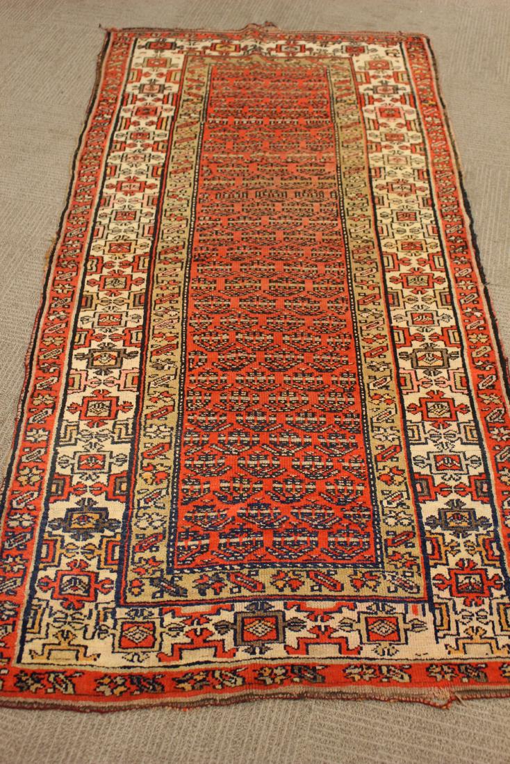 Cuba Persian Carpet: Late 19th early 20th century persian carppet.8' x 46". Condition good lite signs of use