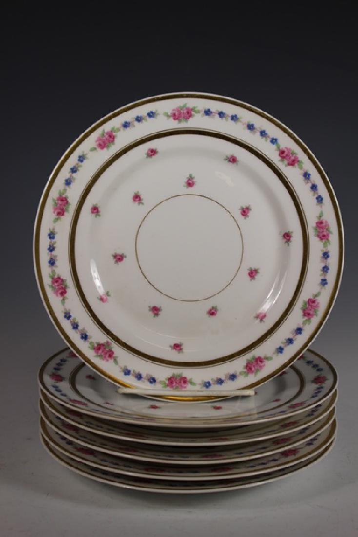 L. Bernardaud & Co. Limoges Salad Plates: Set of six L. Bernardaud & Co. Limoges salad plates with gold gilt and floral pattern. Approx. 8.5". Overall good condition with some gilt lose and signs of use, one with small chip on rim, see photos