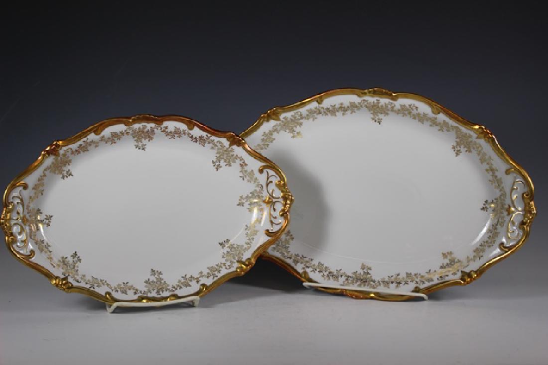 Two Weimar Porzellan German Serving Trays: Gold gilt over white Weimar Porzellan German serving trays. Approx. 12.5"-14.5" by 8"-9.5". Condition very good, see photos.