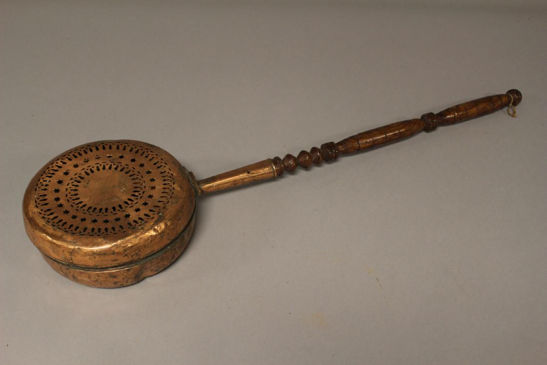 Early English Copper Bed Warmer: Late 18th or early 19th century copper decorated bed warmer with copper rivet pin construction as shown. Normal use and wear. Approx 36" long 10" diameter. See photos.