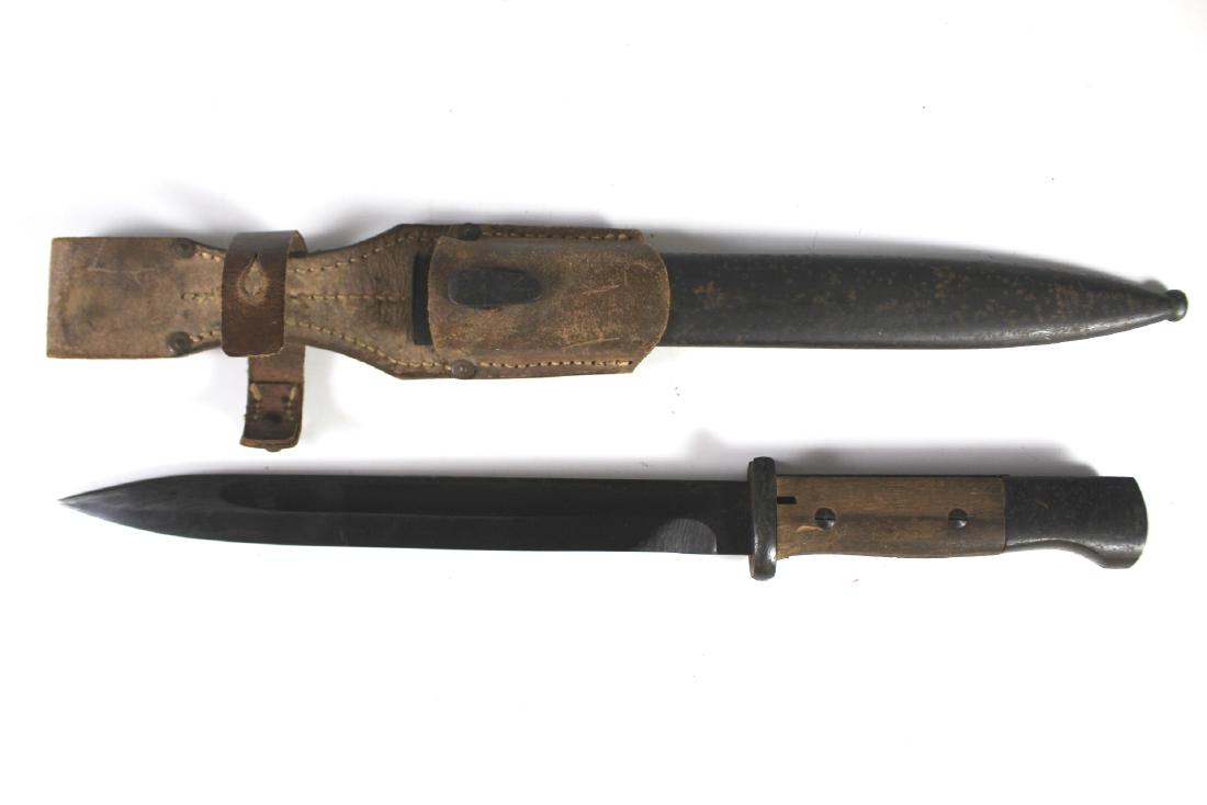 WWII German Nazi Mauser Bayonet: Mauser Bayonet- German WWII Nazi with scabbard sheath belt strap, stamped on both sides as shown. Fitted for German rifle with ropical frog. Approx 16" with sheath. Some signs of use as shown.