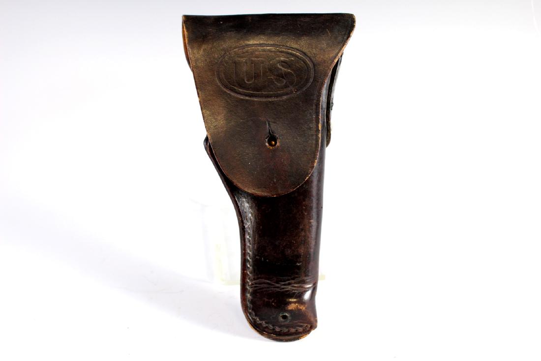 WWII U.S. Holster For The 1911 Automatic: Dark Brown Leather Stamped US holster for the 1911 automatic by Warren. Approx. 10.5" In good age appropriate condition, see photos.