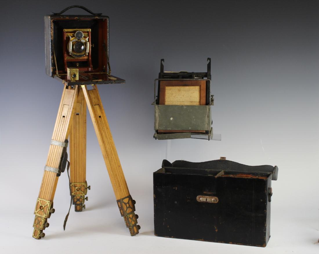 Wollensak OPT Co Camera, Slides and Tripod: Very nice vintage camera set up which includes a folding bellows Wollensak camera, an Eastman's folding head telescopic legs tripod and addition slides with cases. Condition is appropriate for the age