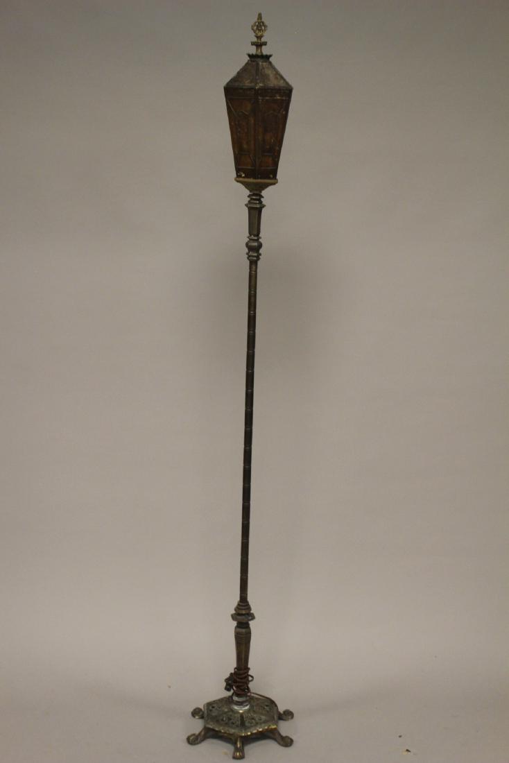 Gothic Style Torchiere Lamp with Mica Panel Shade: Footed 19th century floor lamp with Gothic style.. Paneled Mica shade. Please note some losses to shade and patina. See photos. Standing approx. 5 1/2 ft tall. Working condition.