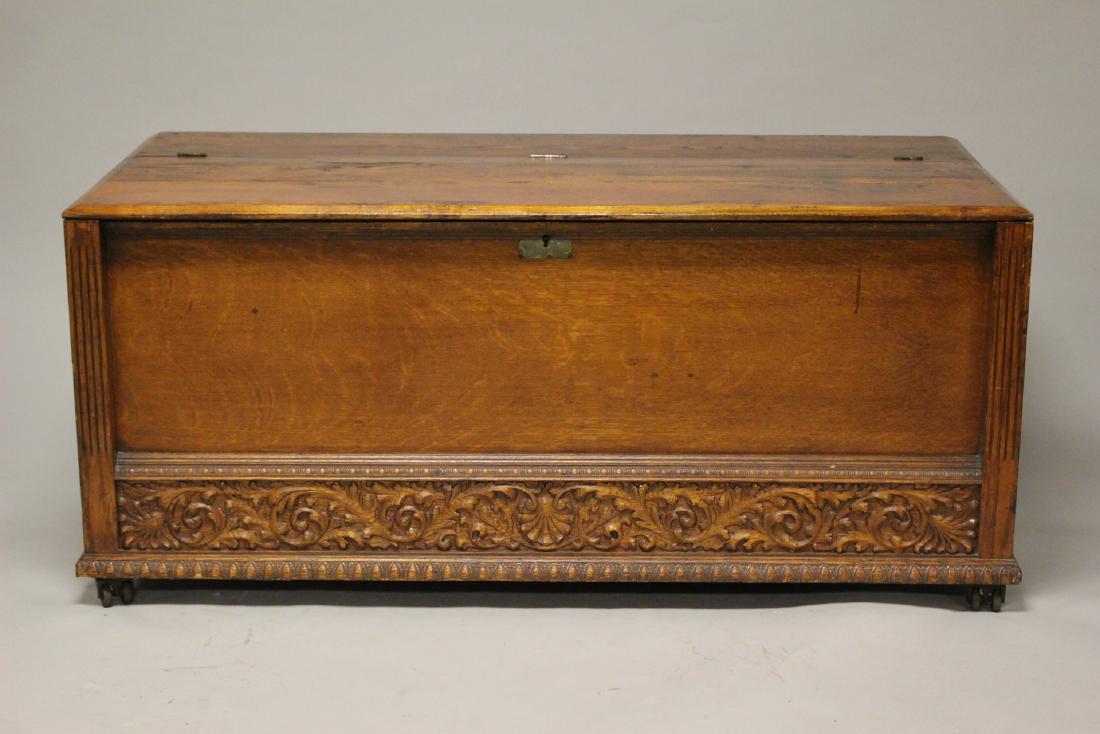 Large American Oak Trunk: Oversized late 19th century American oak chest or trunk, with cast iron handles and castors. Measuring approx. 27" h x 60" (5ft)w x 28" deep. Age appropriate condition as shown, see photos.