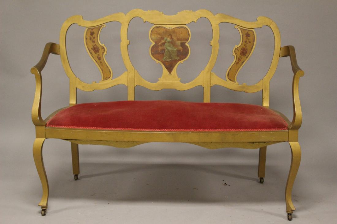 19th Century French Settee: Divided back, gold painted, French style settee with red velvet bench seat. Measuring approx. 37" high x 51" wide x 24" deep. Overall condition is good with some signs of use, dust soil and minor surf