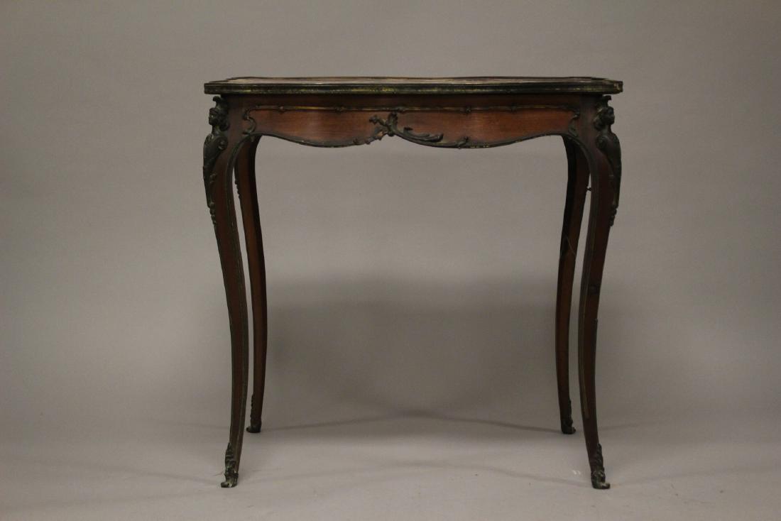 19thCentury French renaissance marble top table: 19th century French satin wood table with bronze mounts. Inset pink marble top note repairs/restoration to marble and dust soil. Able measures approx. 30"hx30"wx20"d. see photos.