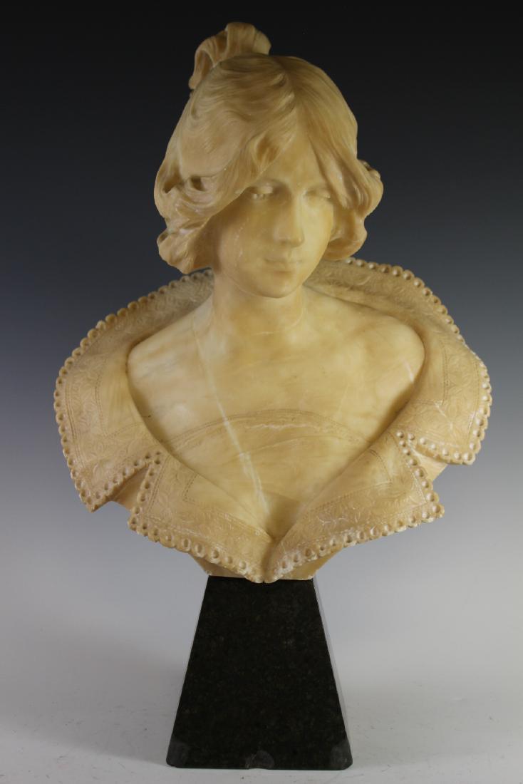 Victorian Carved Alabaster Bust of Woman: Early 20th century carved bust of beautiful young women, wearing a elegant collared dress with embroidery decorated collar seated on a swivel granite base. Some slight discoloration and some chips on 