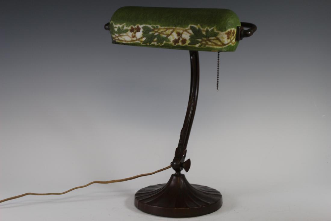 Handel Piano Lamp With Acorn Shade: Signed Bronze HANDEL adjustable lamp with arts and crafts acorn pattern shade. Desk lamp or piano lamp. Number and signed on interior shade and base. Right side with hairline from over tightening as s