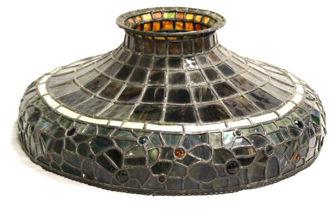 Manner of Tiffany Studios Leaded Glass Lamp: Fine quality early 20th century leaded jewel decorated apron glass chandelier hanging lamp. Strongly represents the manner and style of Tiffany Studios work. See photos to see the well executed hangin