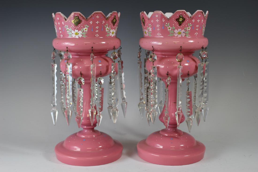 Pair of Victorian Pink Mantle Lusters: Tall form with floral enamel decoration and partial gilt. Some light wear, missing two prisms as shown. See photos. Measuring approx. 14" tall.