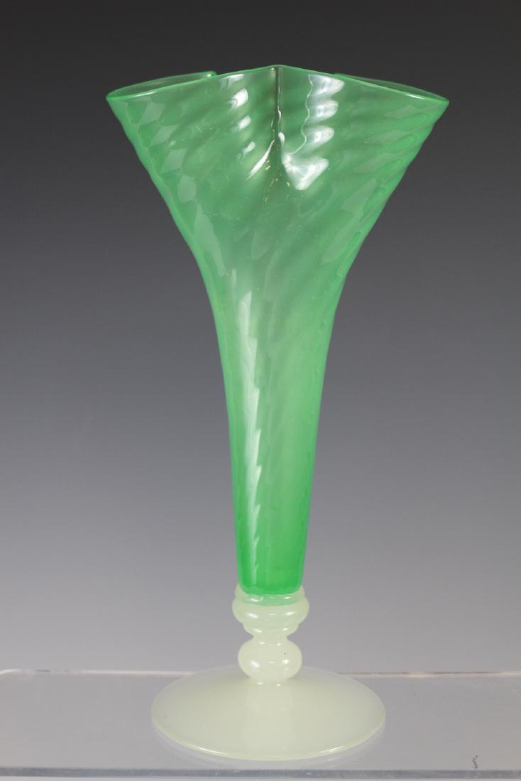 STEUBEN Art Glass Trumpet Vase: Green jade swirl three fold with open alabaster white footed base. Unmarked Steuben glass. Standing approx. 10" tall. Condition is good. See photos.