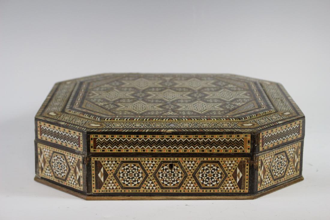 Middle Eastern MOP Mosaic Box: Early 20th century octagonal mother pearl marquetry mosaic hinged lid. Middle eastern, possibly Moroccan. Having original labels, felt interior as shown, Some losses to areas of inlay, See photos. Mea