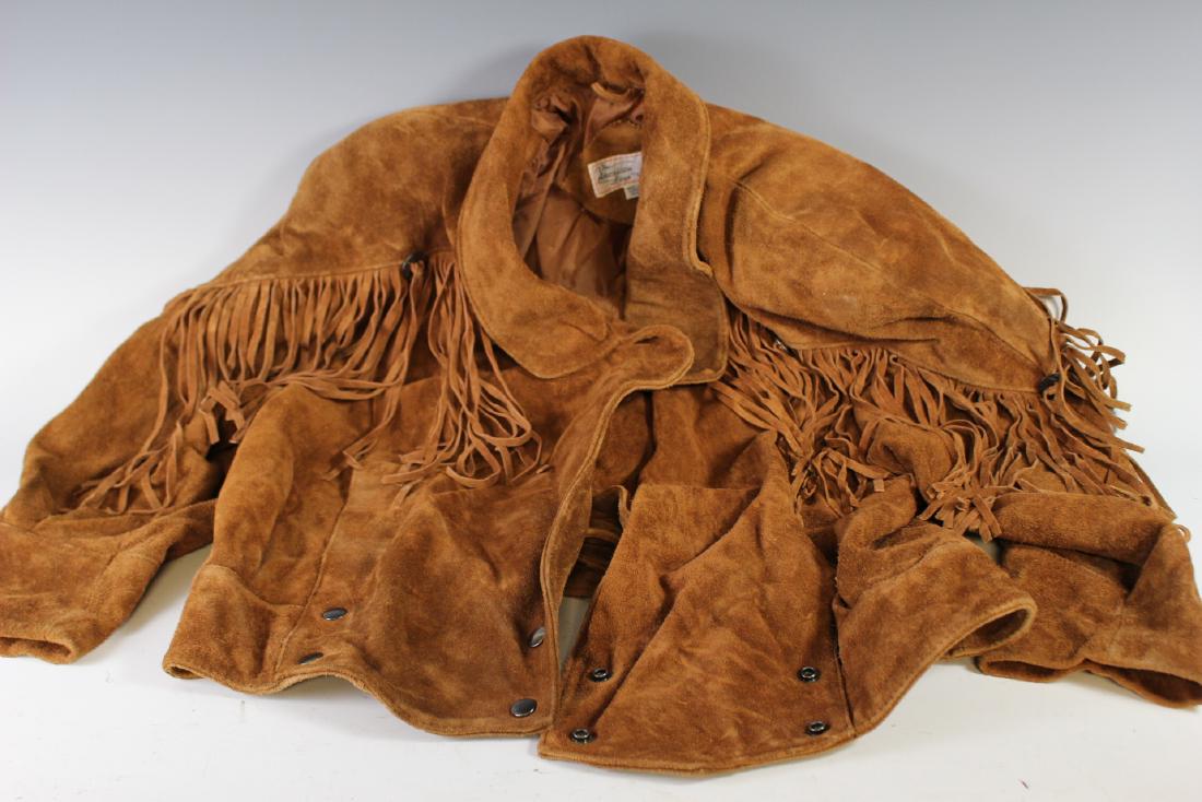 Leather Indian Jacket: THE AMERICAN LINE "Stafano" fringed leather jacket. Stylized like Native American buckskin. Made in Korea for the American market in late 20th century. Size 16w and in good condition as shown.