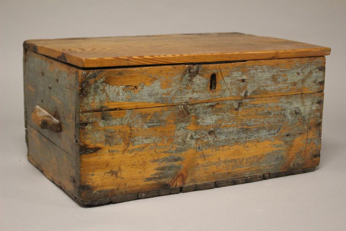 Early 19th Century Carpenter Box: Primitive wood carpenter box, having some original weathered paint. Approx. 10.5" tall by 22.5" wide and 15" deep. Age appropriate condition with later repair to inside lid and no top locking latch, s