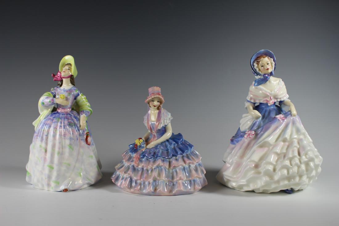 Three Royal Doulton Figurines: Including Chloe HN 1765 Royal Doulton RdNo 764558, Clare figurine, HN 2793, 8" tall and HN3368, 1990, "1991 First Year of Issue", 7.75" Tall, original box