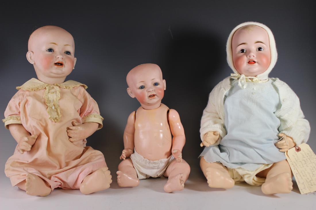 Three Antique German Kestner Bisque Head Dolls 18"-24": Including 24" "Sammy" #211 open mouth with lower teeth, small cheek rub, plaster pate and no damage or repaint to head, 18" "Sammy" no damage to head, finger and toe paint wear and small area of crazi