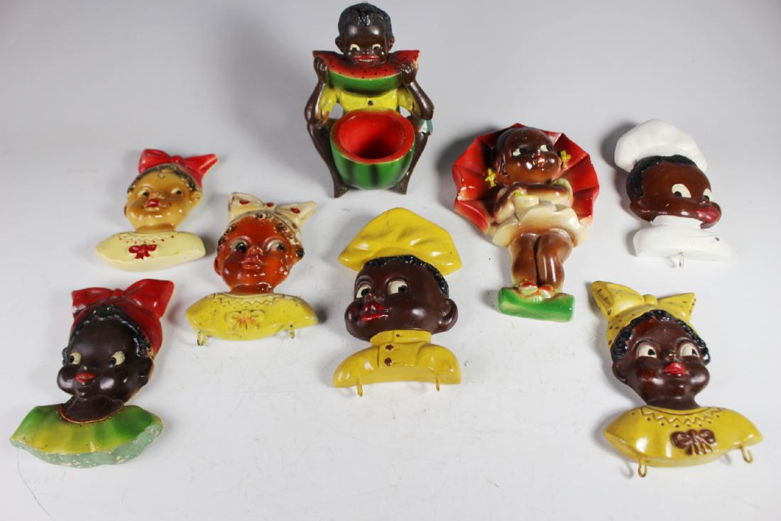 Black Americana Pot Hook Holders & Others: Collection of six (6) black Americana related hook holders and wall decoration. see photos. Composition or chalk painted. Scratches and paint deficient areas are present.