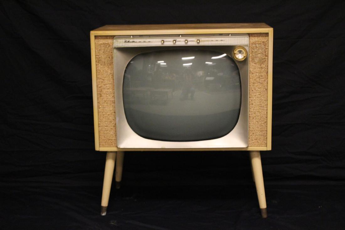 Mid Century Modern Silvertone Television Set: Approx. 31"t x 29"w x 18"d. Overall good age consistent condition, see photos.