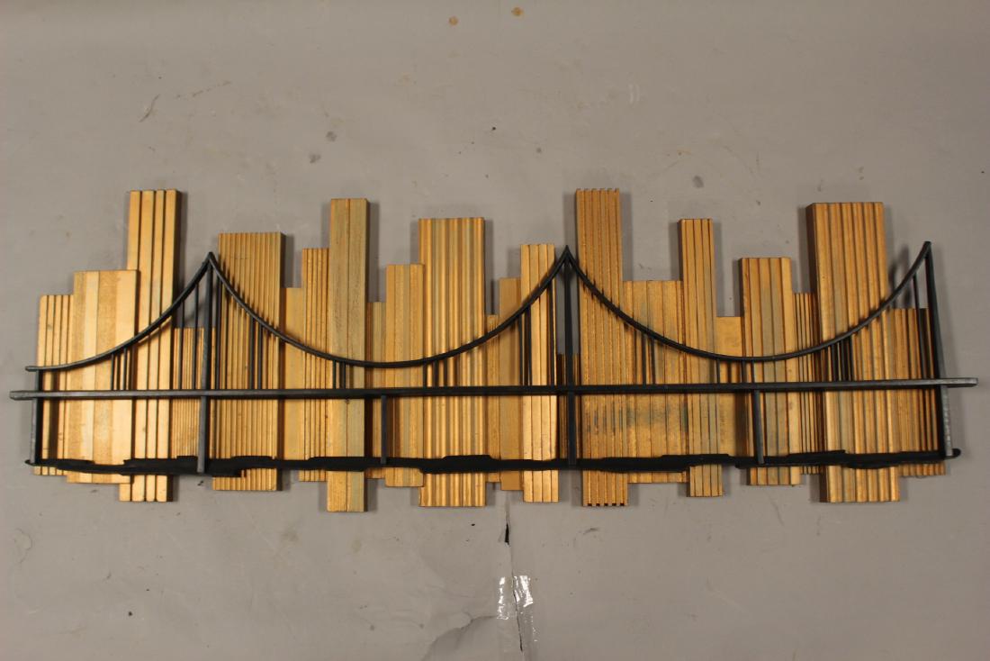 1969 Skyscraper Bridge Sculpture: 1969 Skyscraper bridge sculpture. Signed and dated. Dramatic black over metallic gold. The perfect backdrop for a Mid-Century sofa or centerpiece above a bar or bed. Stamped on verso MCMLXIX Syroco mi