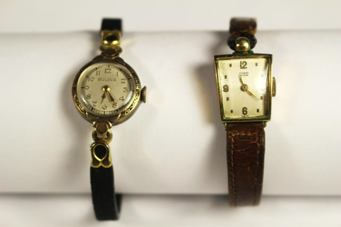 Two Vintage Ladies Wrist Watches: Including a BULOVA gold plated in working condition and a ladies CORD with leather band in working condition, see photos for details.