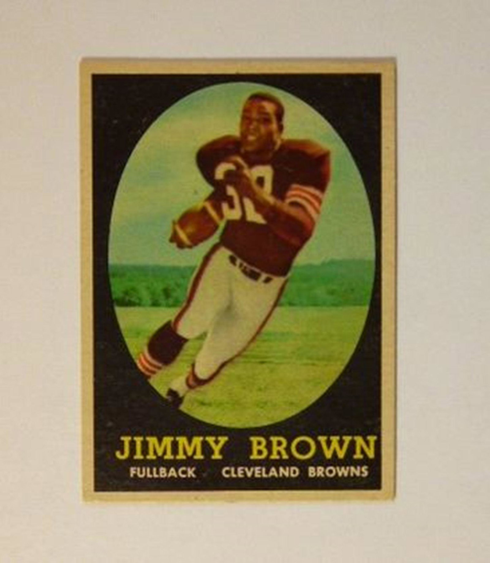 1958 Topps Football #62 Jim Brown Rookie Card: Have you ever had a friend brag about their Jim Brown rookie. Well here is you chance to say yours is nicer! High quality example of one of the industry staples. Great appeal, 95% centering. Baack cor
