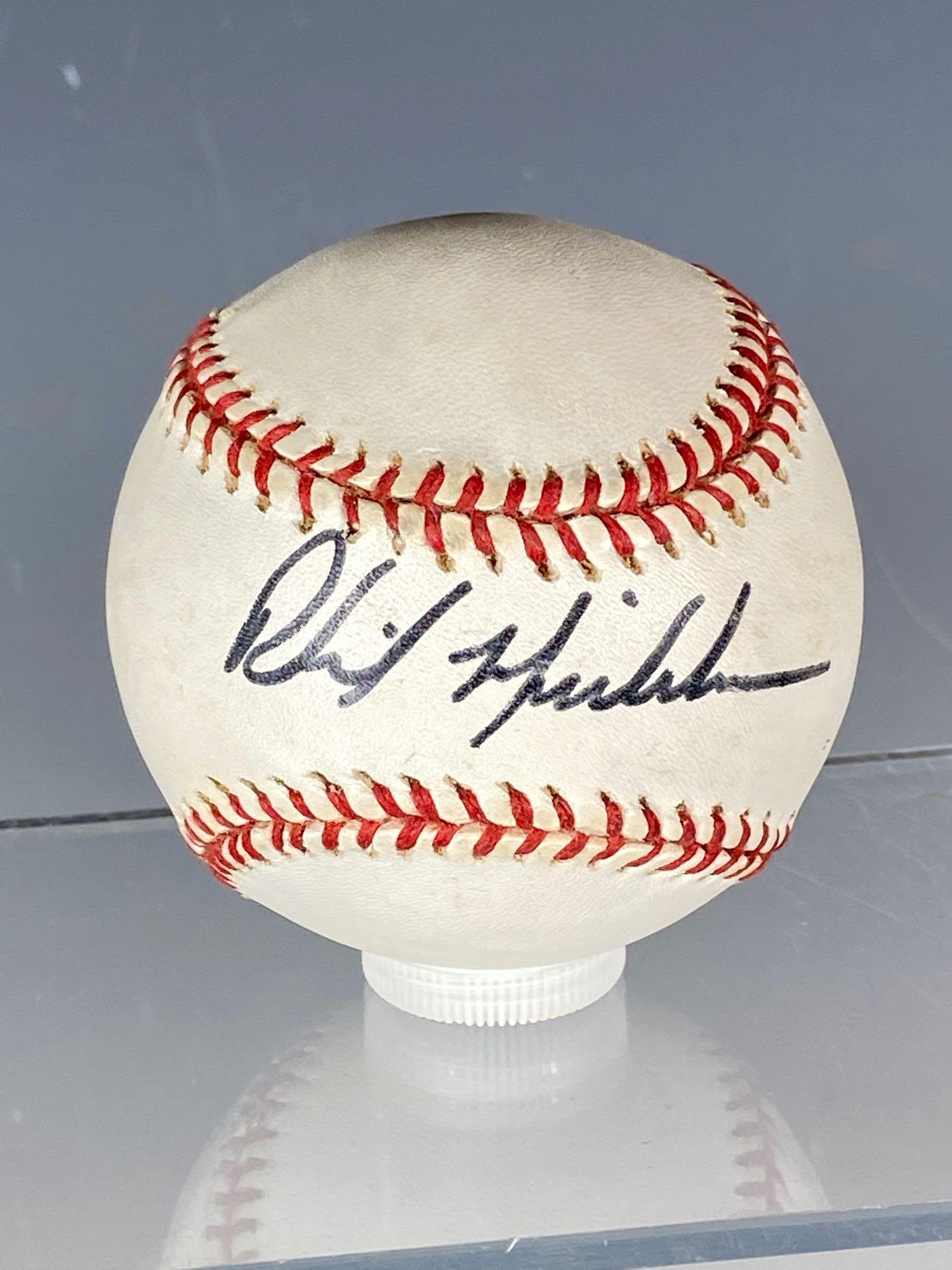 Phil Mickelson Autographed Baseball: Official Leonard Coleman baseball signed on the sweet spot by Mickelson. Very nice, large and clean signature. It is not everyday that golfers sign baseballs, but when they do they are very sought aft
