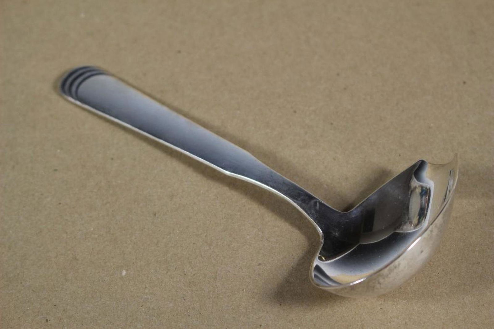 Hans Hansen Denmark Sterling Silver Gravy: Hans Hansen Denmark sterling silver gravy, sauce spoon. 7" length 70.6g Stylized like Goerg Jenson in his simplicity and elegant silver work