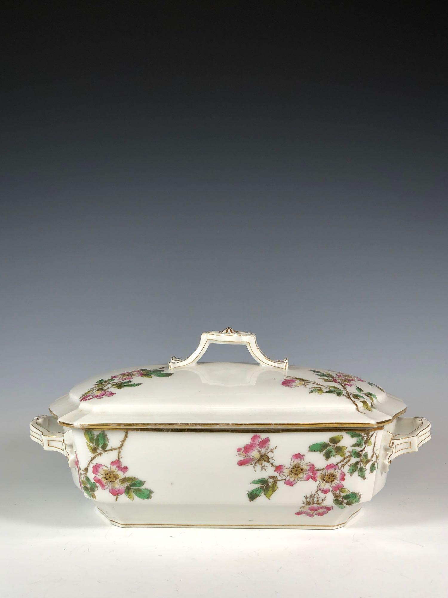 Limoges Depose Lidded Tureen: Limoges Depose Lidded Tureen with Rose Decor. Approx. 5 1/2" tall by 12" wide. In good age appropriate condition, see photos.