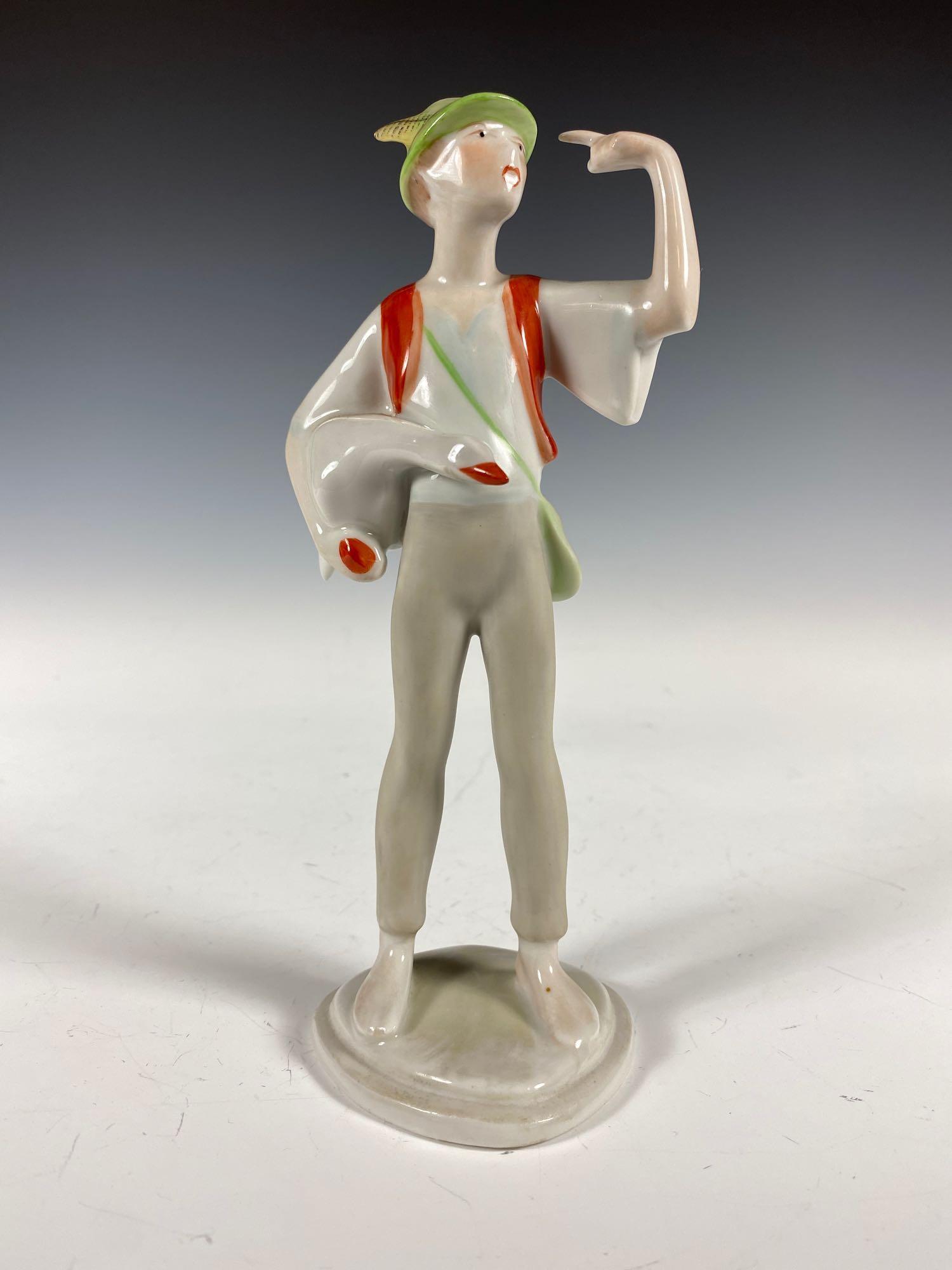 Hollohaza Kezzel Festett Porcelain Figurine: Vintage Hollohaza Kezzel Festett Porcelain Boy with Goose Figure. Restoration to goose tail. Approx. 7 1/4" tall.